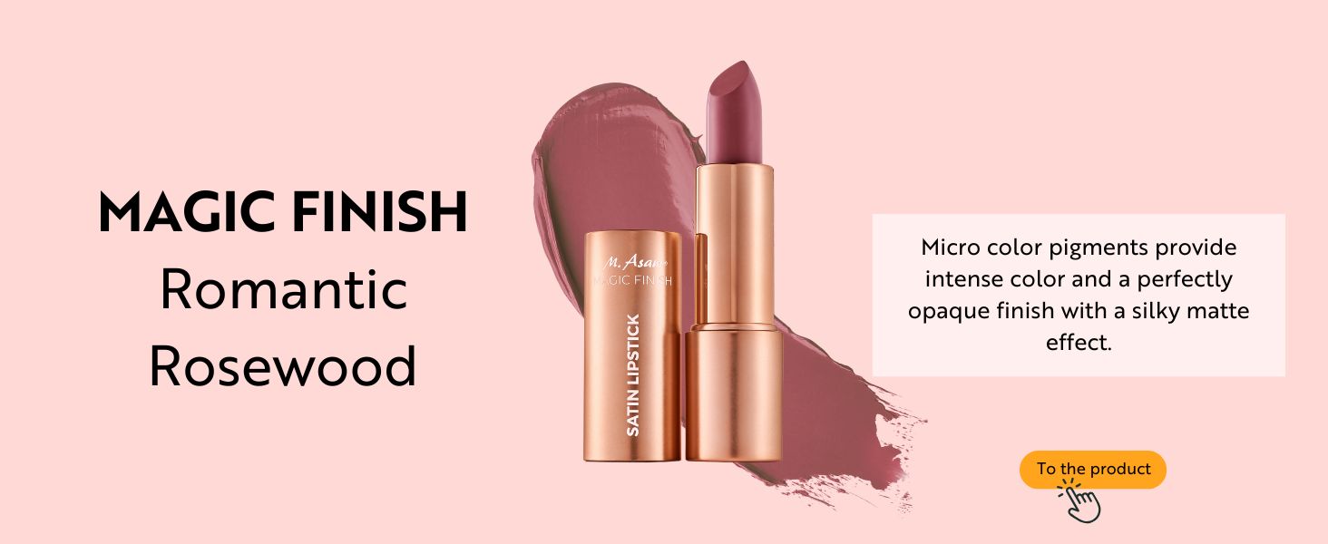 Rose gold lipstick tube with swatch of matte rosewood color. Product labeled 'Magic Finish Romantic Rosewood' with description of micro color pigments and opaque finish.