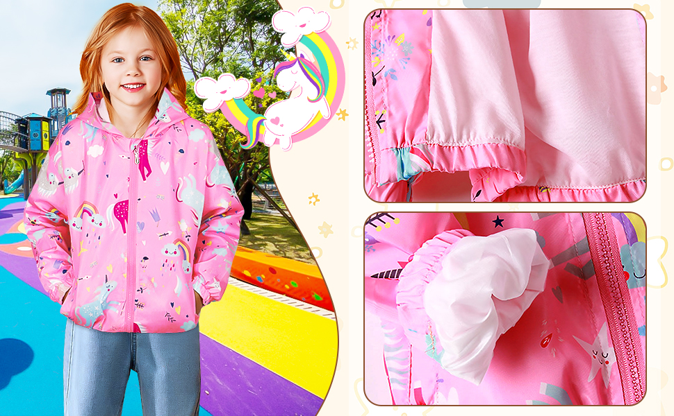 Pink children's jacket with unicorn print. Close-up shows elastic cuff detail. Child wearing jacket outdoors with colorful background.