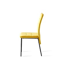 Side view of modern dining chair featuring yellow upholstered seat and backrest with black metal legs, photographed against white background.