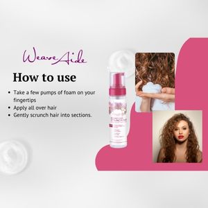 woman with curly hair using foam.