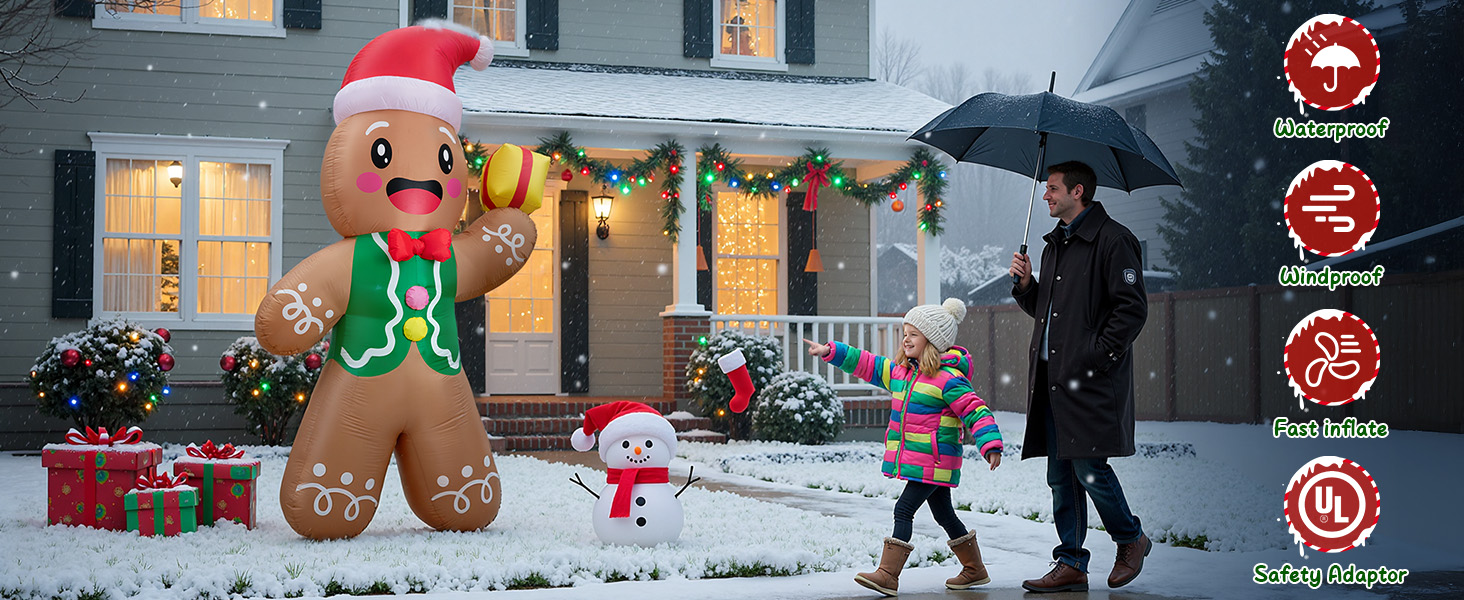 Winter scene with holiday decorations showing outdoor displays of illuminated festive figures in snowy setting.