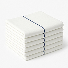 Stack of folded lint-free flat weave dish cloths