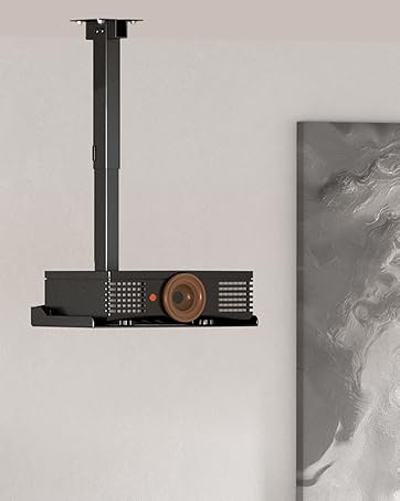 Black gaming controller mount or holder shown attached to wall, displaying multiple angles of installation and usage.