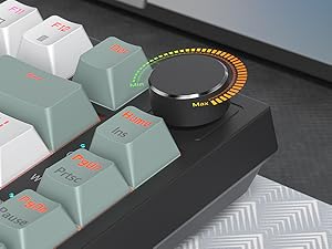 Ergonomic keyboard with knob