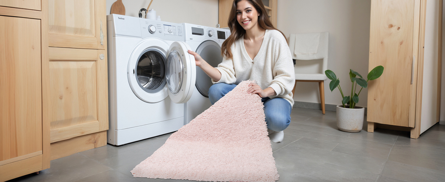 Machine washable pink bathroom rug