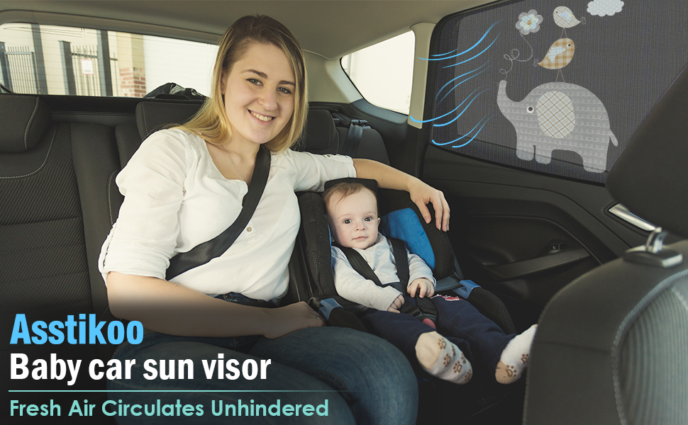 Asstikoo baby car sun visor with elephant design, attached to rear window. Allows fresh air circulation while providing shade for infant in car seat.