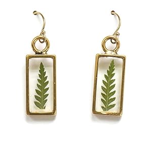 A pair of Olive Bella fern earrings with real fern leaves