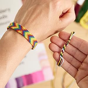 the LIVAIA embroidery thread is ideal for making friendship bracelets, this one is yellow, blue, red