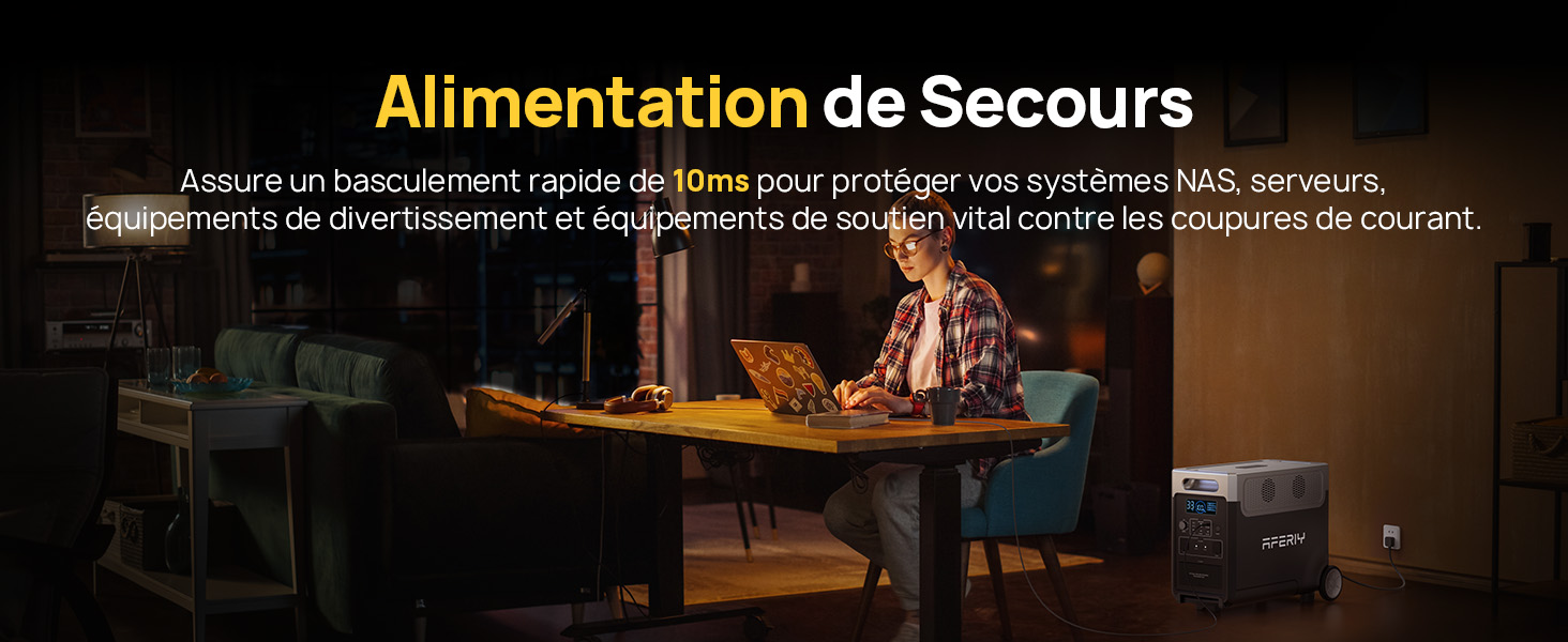 Un appareil électronique noir est posé sur le sol, près d'une table à manger. L'appareil semble être un système d'alimentation de secours destiné à protéger les équipements électroniques en cas de panne de courant