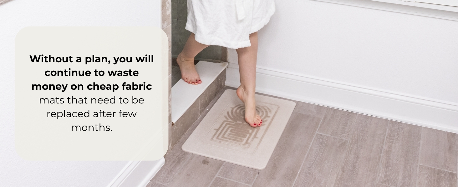 Girl stepping out of shower and stepping on to the bath mat