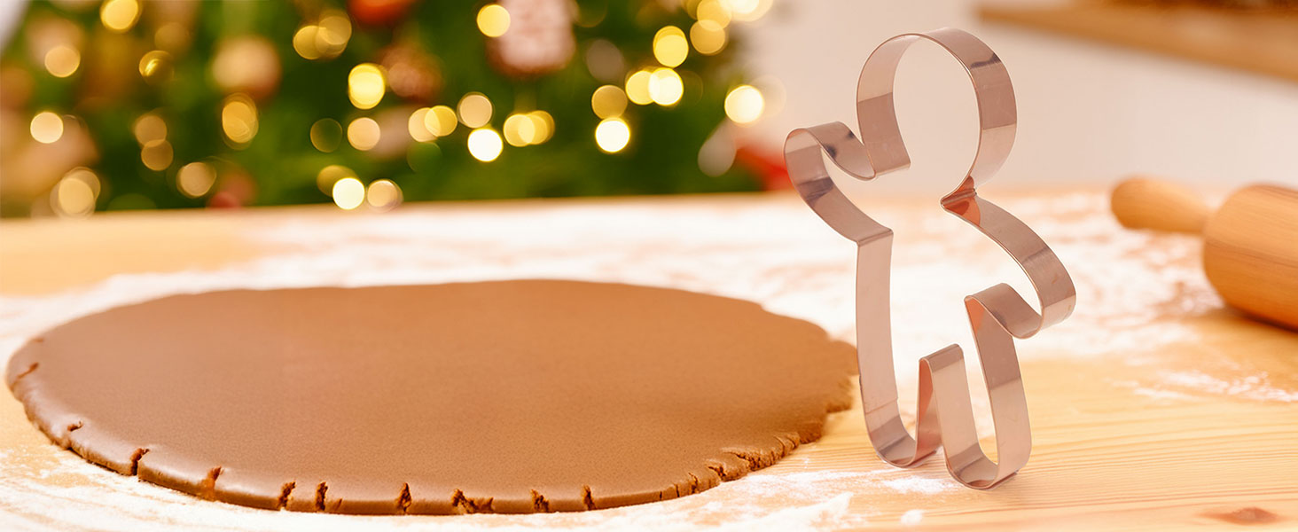  Gingerbread Boy Cookie Cutter used to cut shapes from gingerbread dough, by holiday decorations
