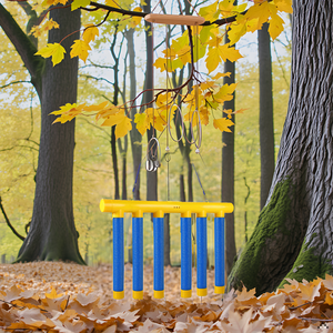 A product on a wooden table surrounded by colorful sticks scattered around.