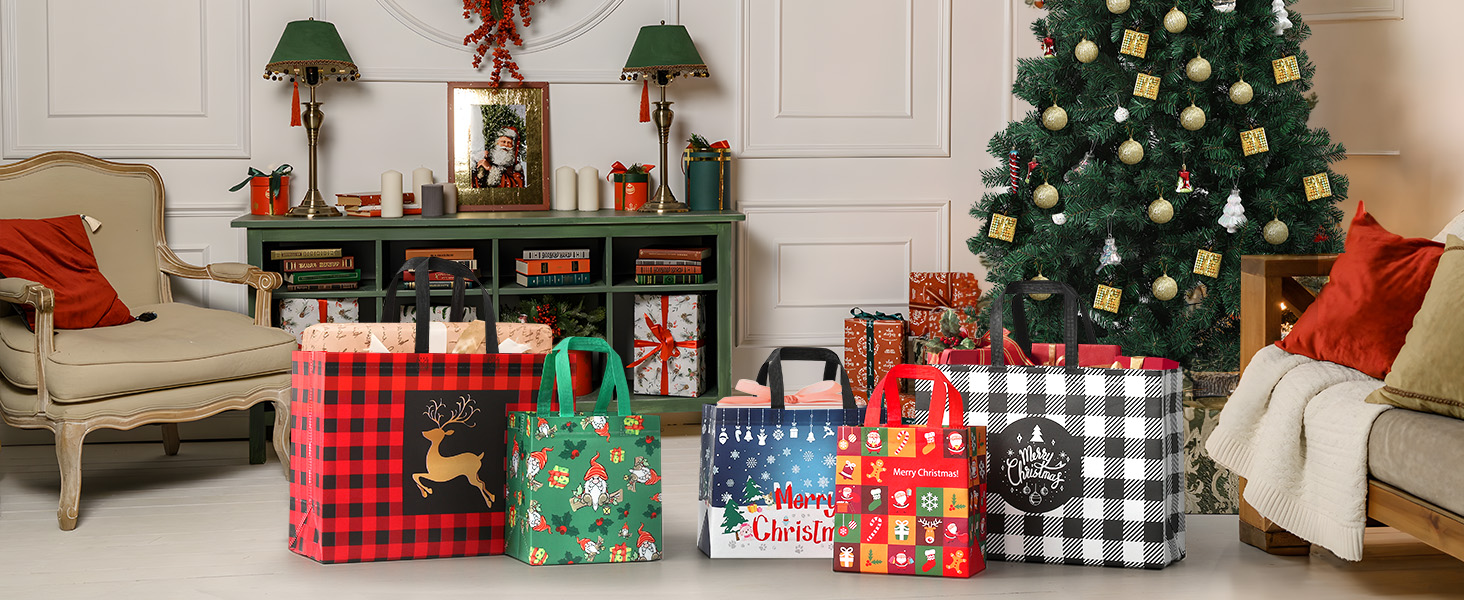 Collection of holiday tote bags and gift bags in various patterns including buffalo plaid and Christmas prints, arranged in front of decorated Christmas tree and green shelf.