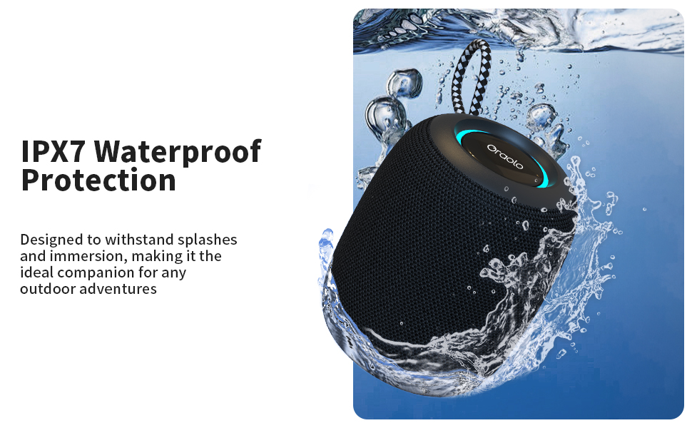 Black portable speaker with IPX7 waterproof protection, shown submerged in water with bubbles. Features a blue light ring and is designed for outdoor use.