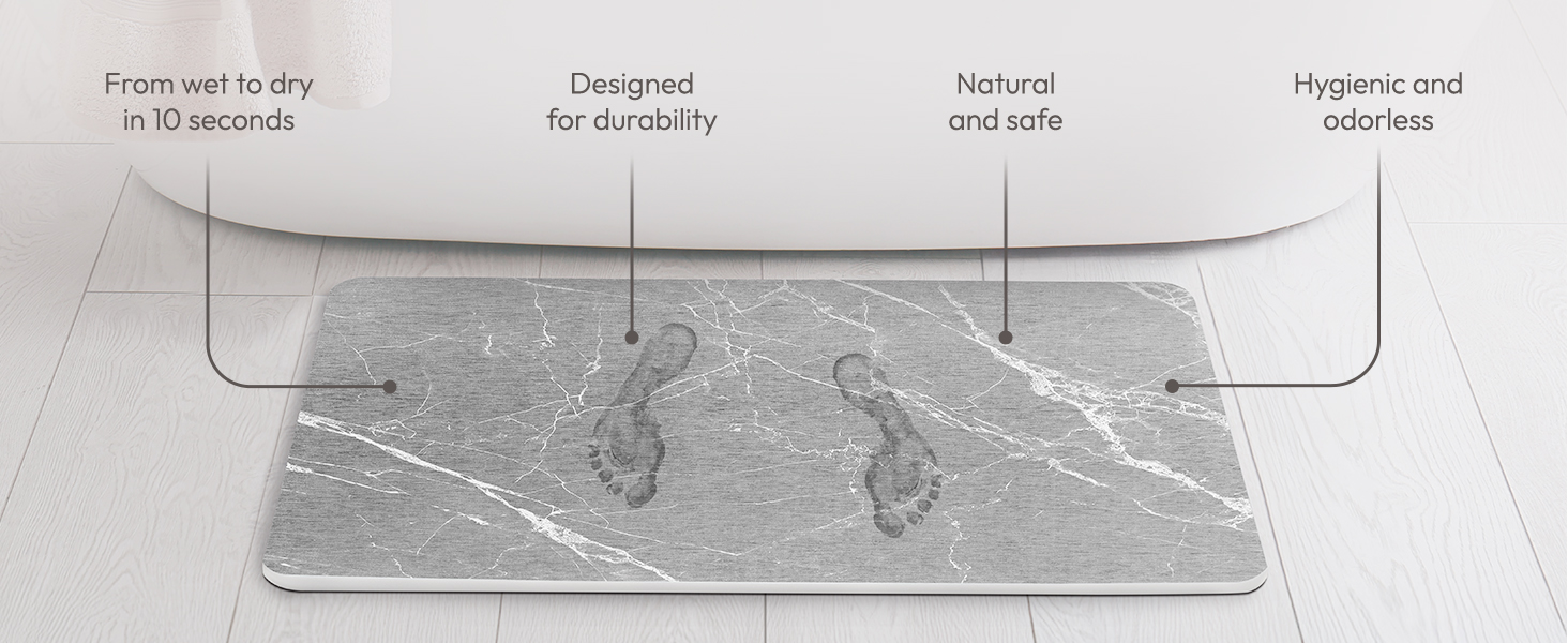 wet footsteps drying on bath rug stone
