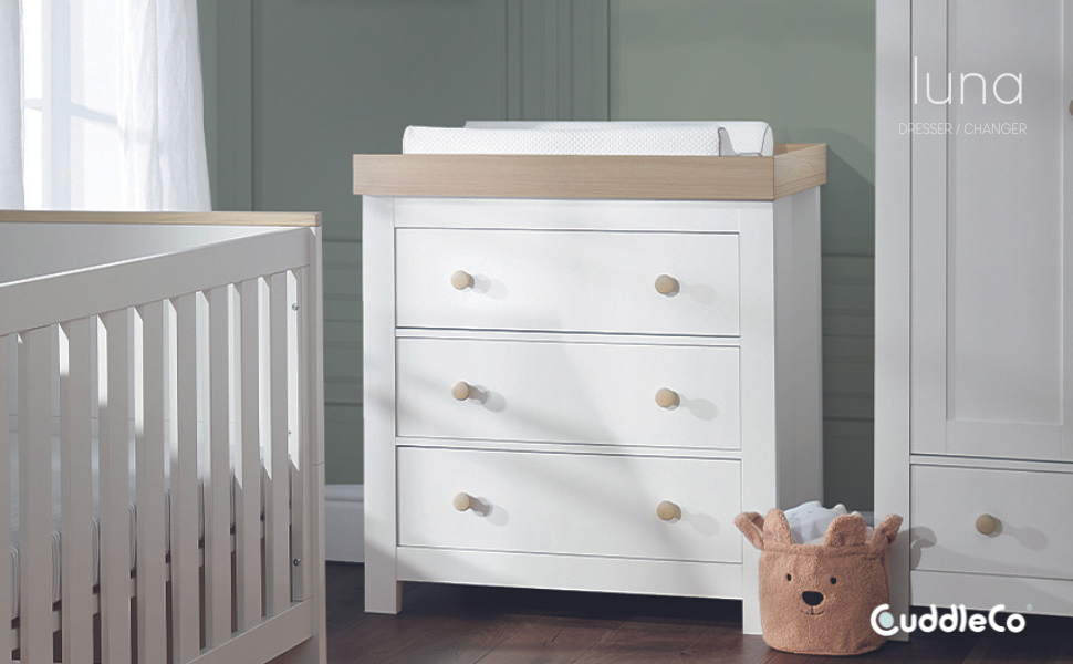 luna dresser and changing unit in white with oak detailing