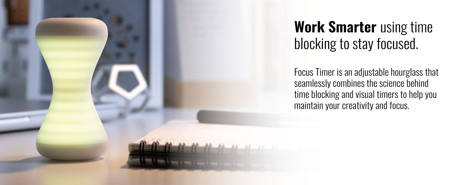 Focus Timer on desk next to pen and notebook used for working and studying