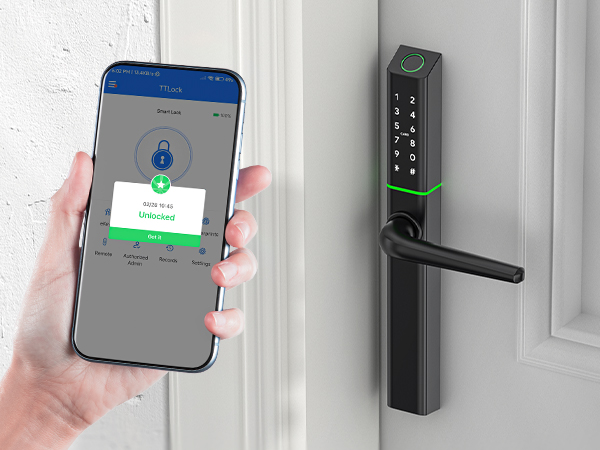 Smart door lock system with keypad and mobile app control. Hand holding smartphone shows unlock interface next to the physical lock.