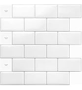 White rectangular tile backsplash pattern. Tiles are arranged in a subway-style layout with staggered edges, creating a clean, modern look. Subtle grout lines visible between tiles.
