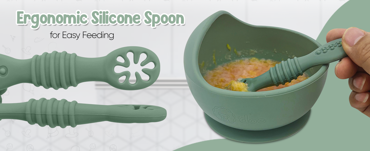 Green silicone spoon with textured handle and flower-shaped end. Text reads 'Ergonomic Silicone Spoon for easy feeding'.