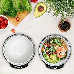 the original stainless steel bowl with a bowl of salad