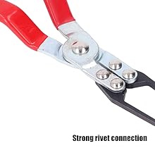 Close-up of red-handled pliers showing rivet connection point with multiple metal rivets visible in the joint mechanism.