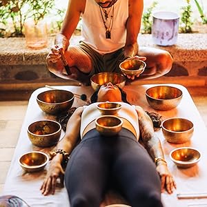 Guided hypnotic sound journey with Tibetan and crystal alchemy bowls.