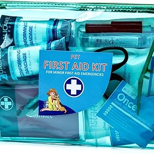 Transparent teal pet first aid kit containing various medical supplies for emergency pet care.