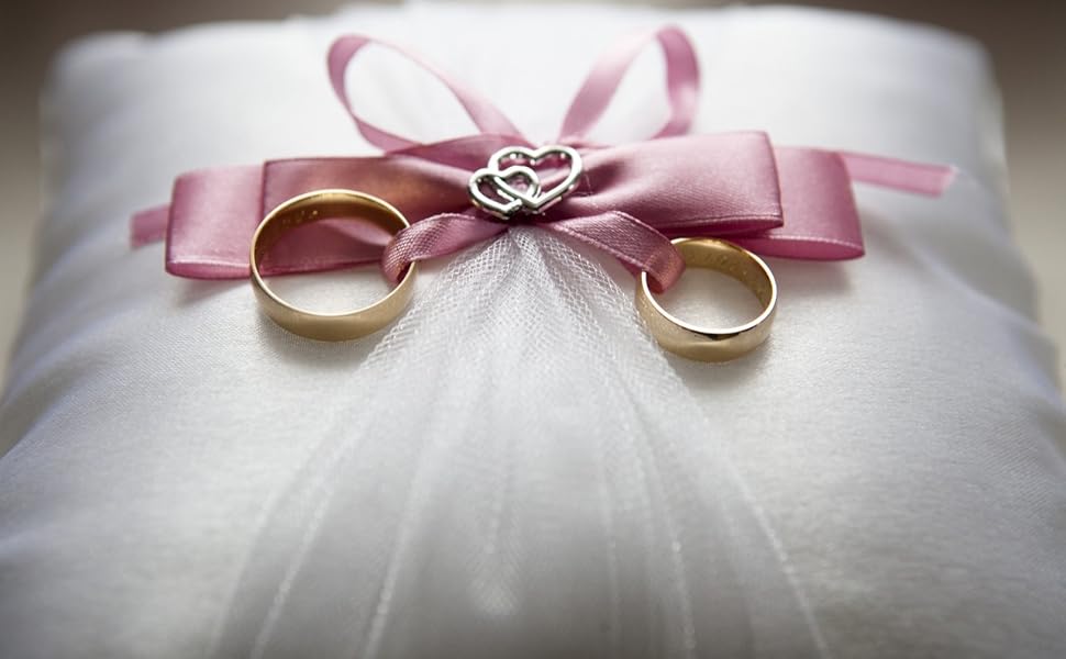 Wedding rings on pillow