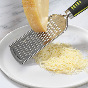 Medium Shredder great for grating of root vegetables, butter,parmesan cheese