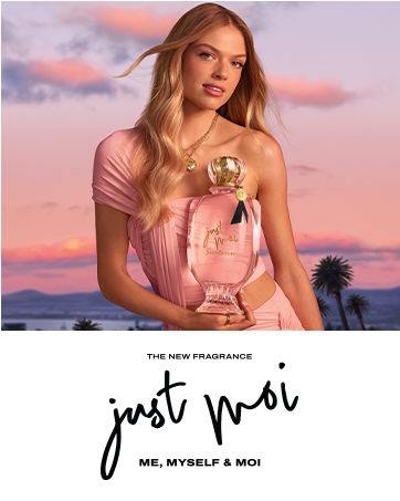 Model with Juicy Couture Just Moi perfume bottle