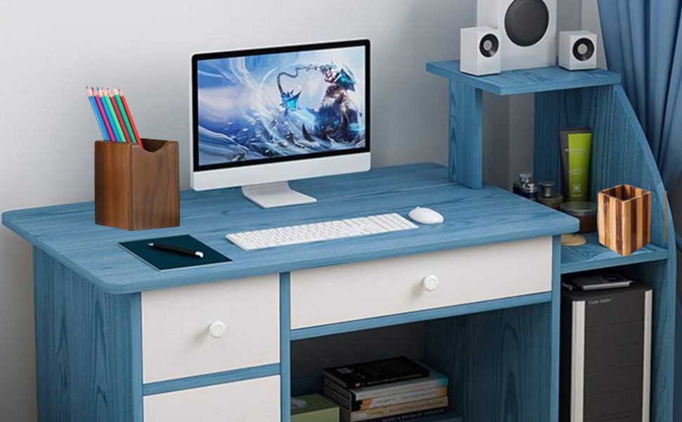 wooden pen holder on office table in use as organizer