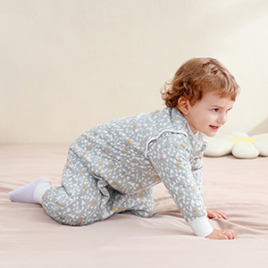 Sequence of images showing crawling movement on floor, wearing light-colored clothing.