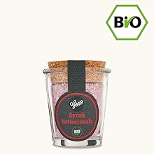 Der Text lautet „BIO“. Abgebildet sind mehrere Gläser mit Aufstrichen oder Konserven mit dunklem Inhalt in Glasbehältern.