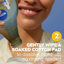 IMAGE: Step 2: Gently wipe a soaked cotton pad to mix the bi-phase formula