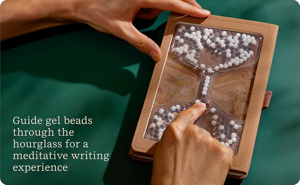 guide gel beads through the hourglas for a meditative writing experience
