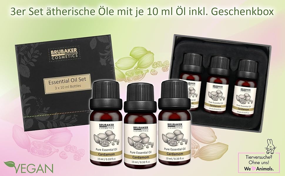 3 Flaschen ätherisches Öl mit Kardamon in einer eleganten schwarzen Geschenkverpackung