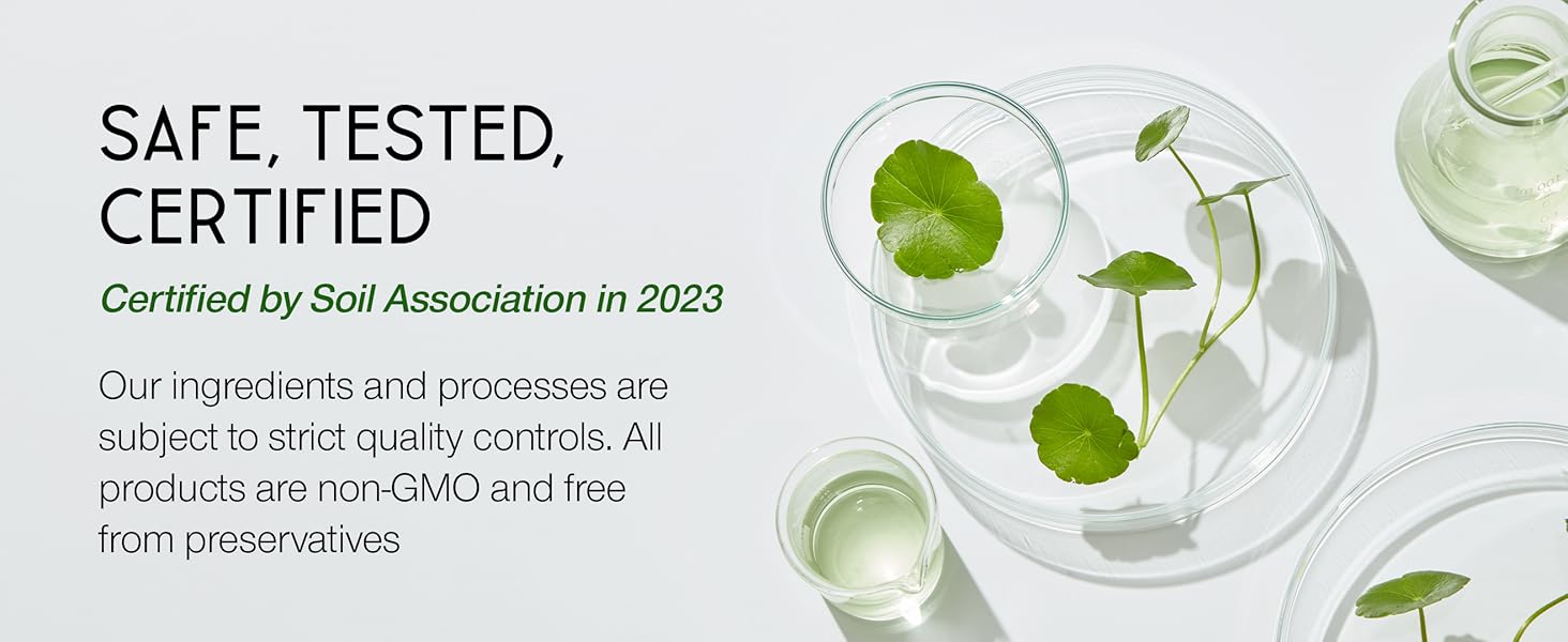 Clear glasses with green liquid and mint leaves. Product certified as safe and tested, emphasizing natural ingredients without GMOs or preservatives.