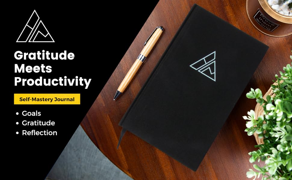 Black Self-Mastery Journal on a Desk