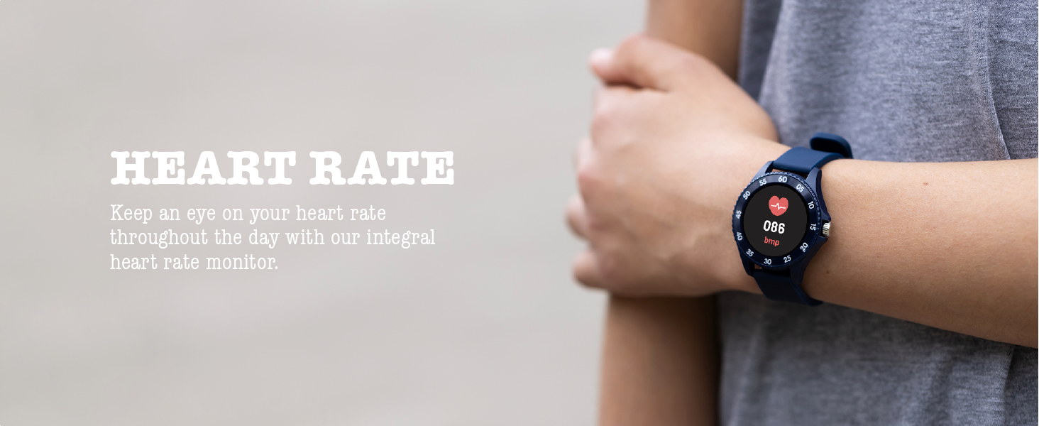 Text reads 'HEART RATE'. Close-up view of wrist wearing dark-colored smartwatch or fitness tracker against gray background.
