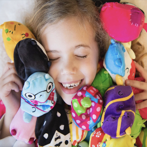 girl with 4" plushies