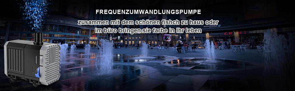 Frequenzumwandlungspumpensystem vor einer nächtlichen Stadtlandschaft mit beleuchteten Springbrunnen. Schwarzes rechteckiges Gerät mit sichtbarem Gittermuster.