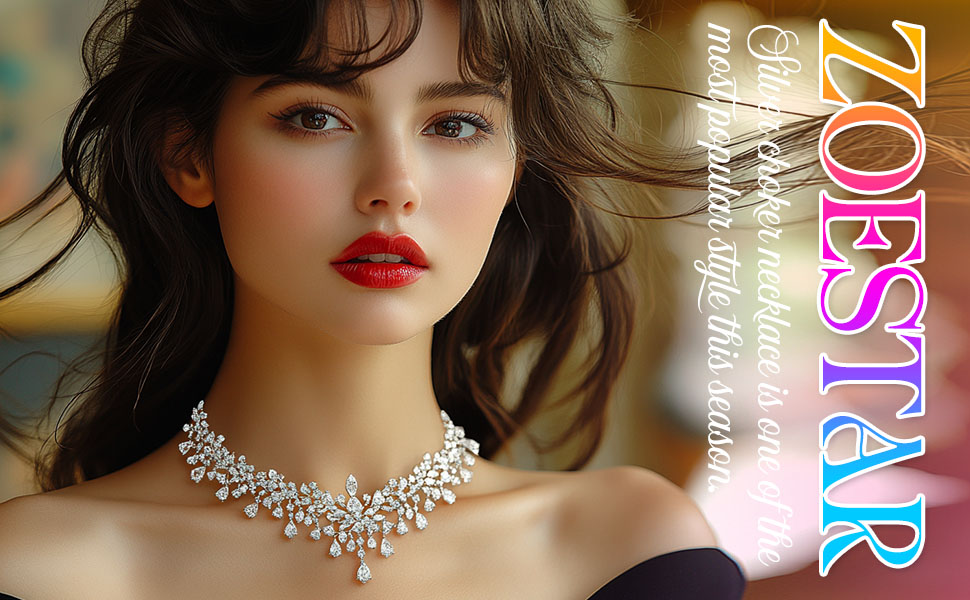 Elegant diamond necklace with floral design and teardrop accents, featuring multiple small stones clustered in intricate patterns around a central larger diamond.