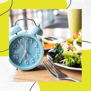 clock and plate of food