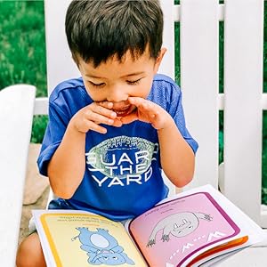 Boy sounding out letter "e"