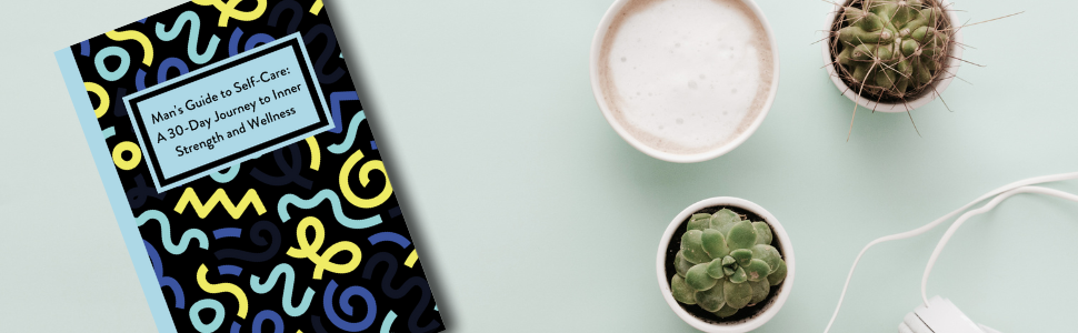 journal on desk with cactus