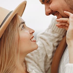 Woman and man Staring into eachother eyes smiling