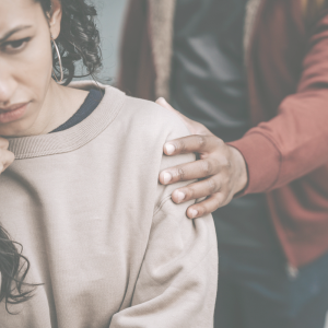 Woman sad or mad while her partner is consoling her