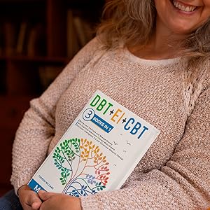 A happy woman is holding the bundle inside her home