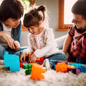 Child playing with parents